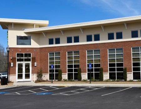 How Regular Commercial Pressure Washing Protects Your Brand’s Curb Appea